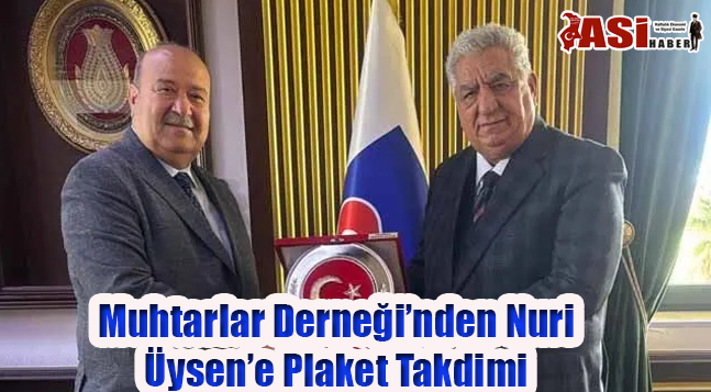 Muhtarlar Derneği’nden Nuri Üysen’e Plaket Takdimi